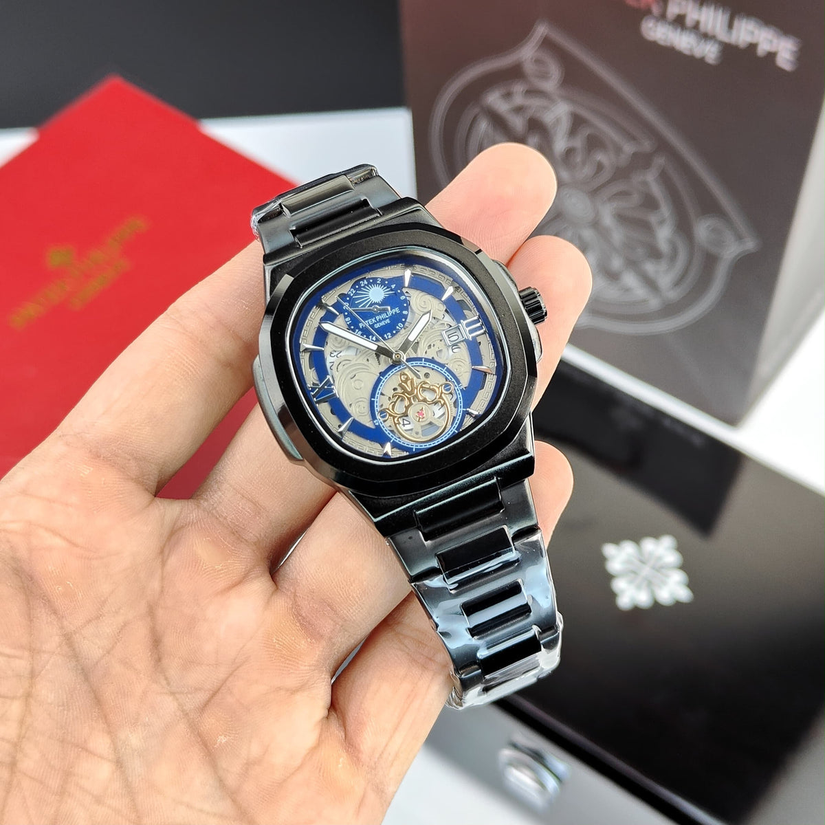 PATEK PHI_LIPPE WRIST WATCH A DARK BLACK  DIAL WITH DATE WINDOW